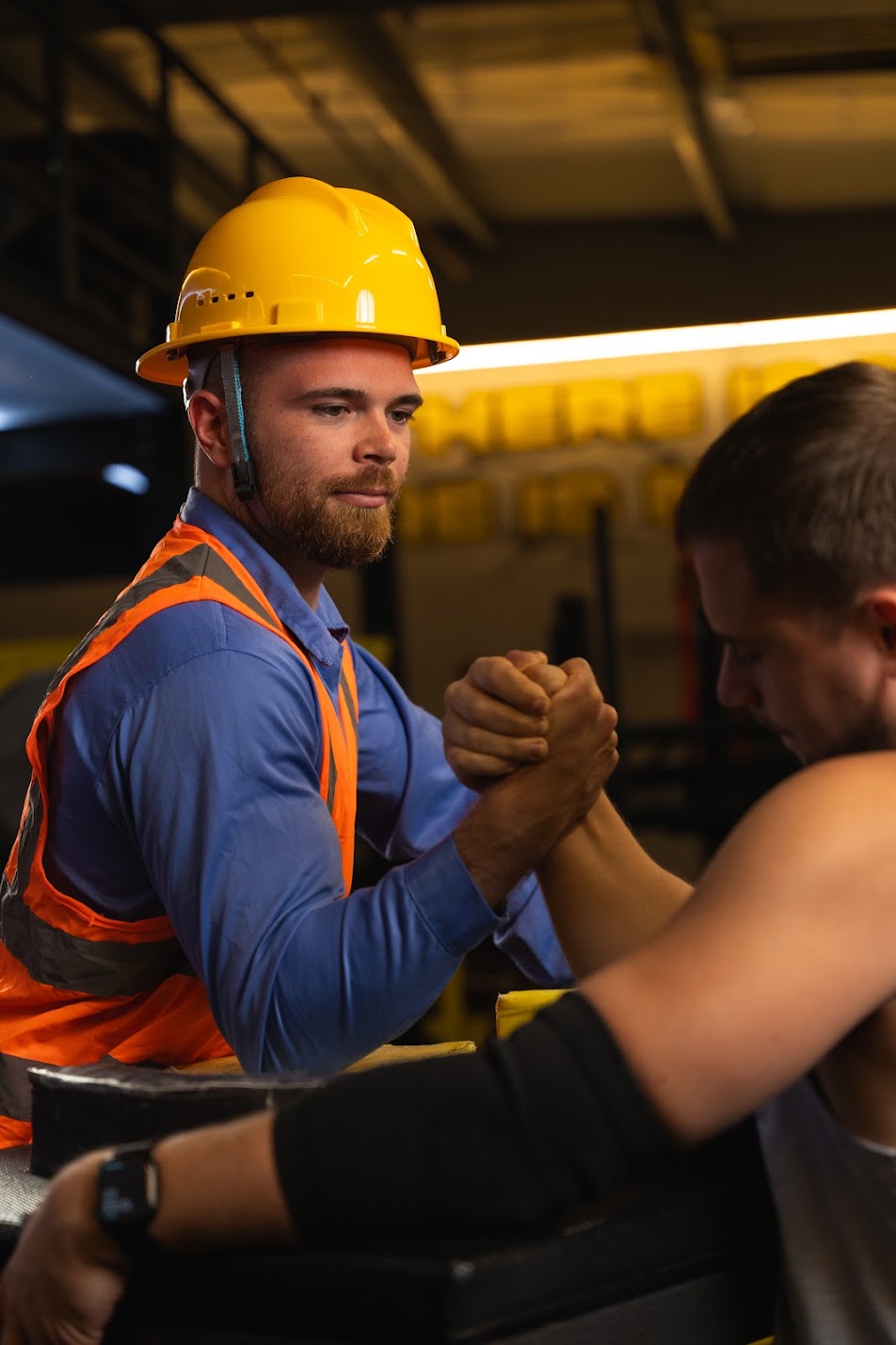 Max Polishchuk at the armwrestling table