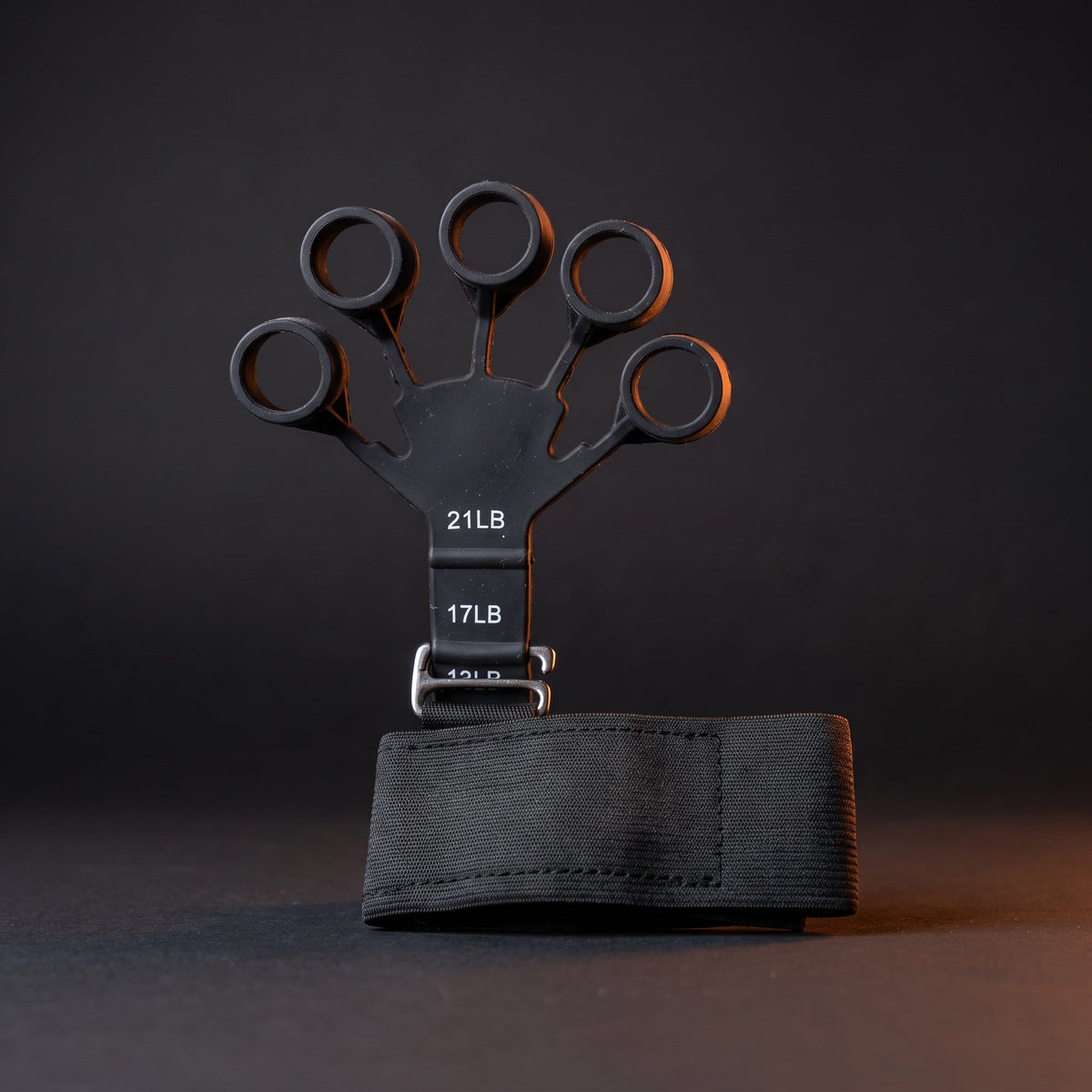 Finger strengthener with wrist strap